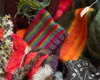 Handmade felted wool handbags, hand knitted scarves, hand knitted hats, hand knitted socks, handsewn bags of various shapes and sizes. (I made too many things, y'all!)