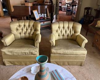 Pair of vintage tufted chairs