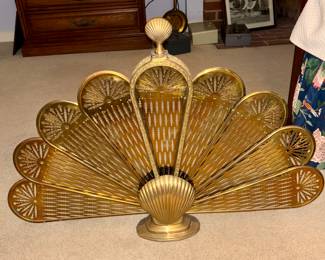 Immaculate condition clam shell peacock style solid brass fireplace fan. Elegant and functional 
