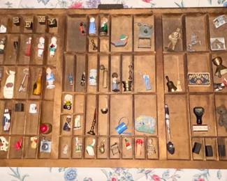 Antique letter press drawer loaded with amazing one of a kind miniature collectibles .  