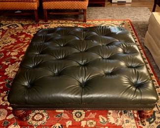 Amazing genuine leather upholstery, on a low large over 3ft by 3ft ottoman on wheels! 
