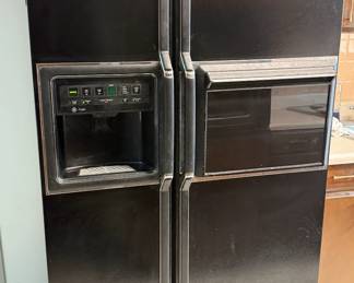 GE Profile 26.6 CU FT side-by-side fridge/freezer with water/ice dispenser