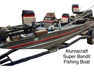 Alumacraft Super Bandit fishing boat with Evinrude motor on a Jeff Hustler trailer
