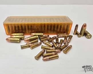 1404 123 Rounds of .22lr and 7 Rounds of 9mm Ammo