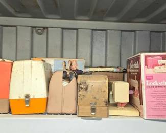 7512  11 Childs Sewing Machines with Carrying Covers 
