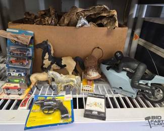 7556  Figurine, Toy Gun, Hot Wheels Car, Electronic Motorcycle Guy  Cassette Tape 