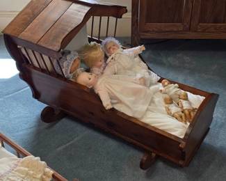 Wood cradle and dolls