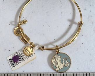 Alex and Ani bracelets with boxes