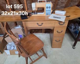 Vintage Kenmore sewing machine, cabinet and chair