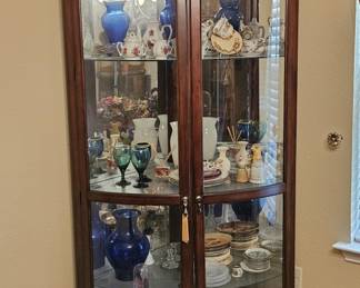 Lighted, Rounded Front Corner Curio Cabinet