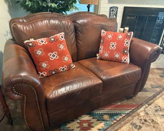 Leather Loveseat with nail head trim