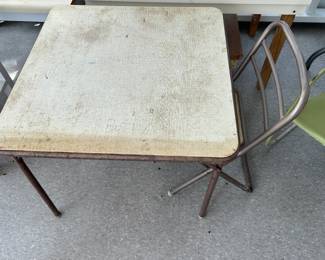 Child’s folding table and chair.