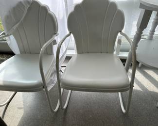 2 clam back metal chairs in excellent condition.