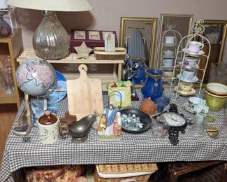 lots of small "shelf" decor of all kinds, multiple lamps