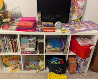 lots of coloring books, kids books, school supplies. lego, small tv