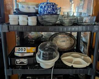 the kitchen is exploding into the dining area, shelves of small appliances