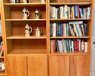 Companion oak shelving unit with open shelves and bottom cabinets. Perfect for displaying glassware, collectibles, or household items.