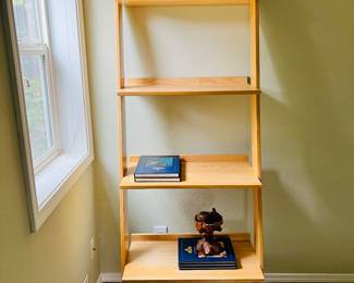 Ladder-Style Display Shelf
Minimalist light-wood ladder shelf with three tiers. Sleek design for books, plants, or decorative accents.