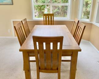 Dining Table with 6 Chairs
Solid wood rectangular dining table with six matching slat-back chairs. Warm finish, sturdy build, perfect for family dining or entertaining.