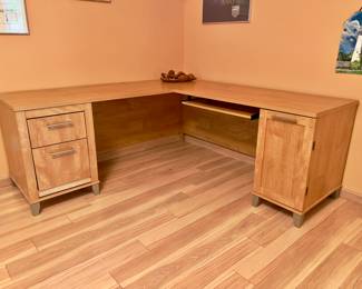 Large Corner Office Desk
Spacious L-shaped desk with drawer storage and cabinet. Light wood finish, clean lines, and practical for home office or study.