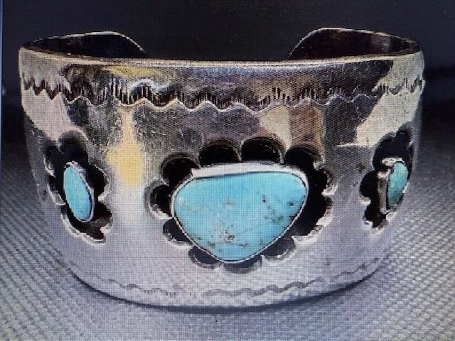  Three turquoise cabochons resting in smooth silver bezels. Pictures do not do the jewelry justice. For more details go to: https://modestlambestatesales.hibid.com/