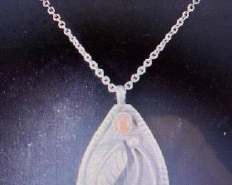 Vintage solid sterling silver, natural turquoise, & coral pendant necklace by Zuni silversmith Jose Calavaza. Recesses retain original patina. Pictures do not do the jewelry justice. For more details go to: https://modestlambestatesales.hibid.com/