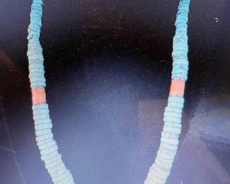 Coral and turquoise. Pictures do not do the jewelry justice. For more details go to: https://modestlambestatesales.hibid.com/