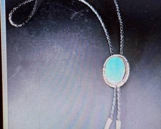 Wedding Bolo tie. Pictures do not do the jewelry justice. For more details go to: https://modestlambestatesales.hibid.com/