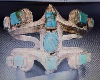 Heavy gauge cast sterling silver, along with gorgeous light blue turquoise cabs. Pictures do not do the jewelry justice. For more details go to: https://modestlambestatesales.hibid.com/