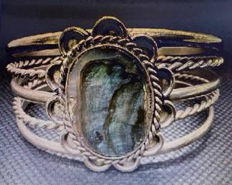 Stamped inside the center "Hegnoen Mexico". Southwest style jewelry. Weight 30 grams. Pictures do not do the jewelry justice. For more details go to: https://modestlambestatesales.hibid.com/