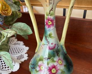 Decorative porcelain vase likely dates rom early to mid-20th century.