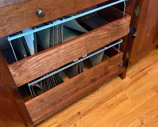 These are the file drawers that glide out for easy use.