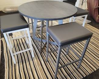 5" x 8" Rug. High Top Table and Stools.