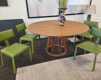 Florian Schmid Table. 4 Maria Yee Chairs.