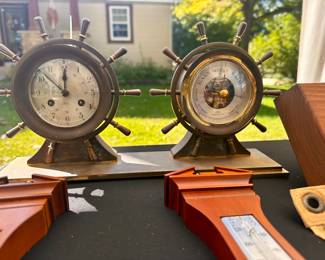 Solid brass clock and barometer. Clock works. Heavy and beautiful.
