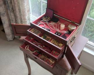 Open view of jewelry box with additional jewelry for sale