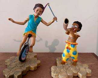 Thomas Blackshear’s Ebony Visions Jamboree Parade Collection Figurines, “Pedalin’ Pete” and “Rudy Toot” 
