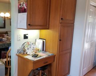 Kitchen incudes a work station and pantry