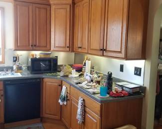 U-shaped kitchen has plenty of upper and lower cabinets