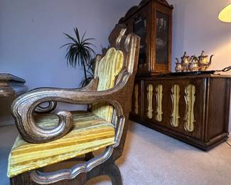 This MCM table has entertained some of the finest in the music industry. It can be made smaller (the middle glass section can be removed). It is on casters and has 6 beautiful chairs with a unique velvet pattern.