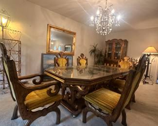 This MCM table has entertained some of the finest in the music industry. It can be made smaller (the middle glass section can be removed). It is on casters and has 6 beautiful chairs with a unique velvet pattern.