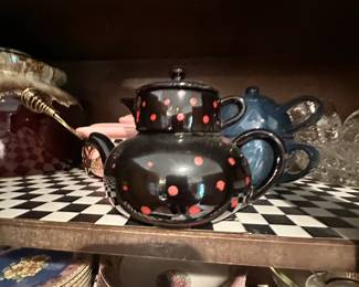 vintage Japanese Redware pottery tea-for-one set, featuring a black teapot with red polka dots 