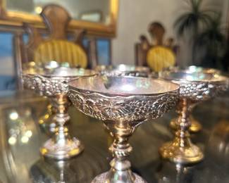 Gorgeous silver goblets with an intricate design
