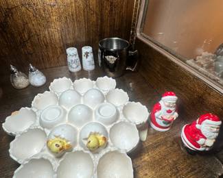 vintage Enesco Chick White Ceramic Egg Holder, vintage salt and pepper shakers, and vintage Santa shakers.
