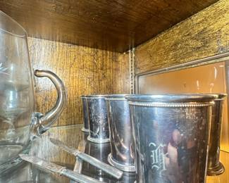 antique silver-plated cups with the letter "H" and antique silver-plated flatware