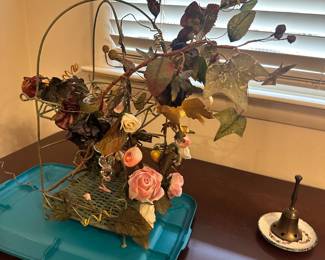 decorative floral arrangement with artificial flowers
