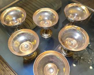 Gorgeous silver goblets with an intricate design