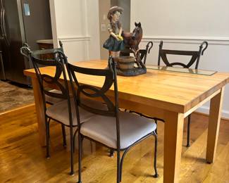 oak dining table and iron back chairs