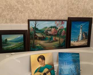 Framed landscape paintings and a Bryan White portrait
