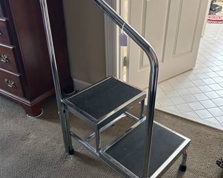 2 McKesson medical step stools with handrail.